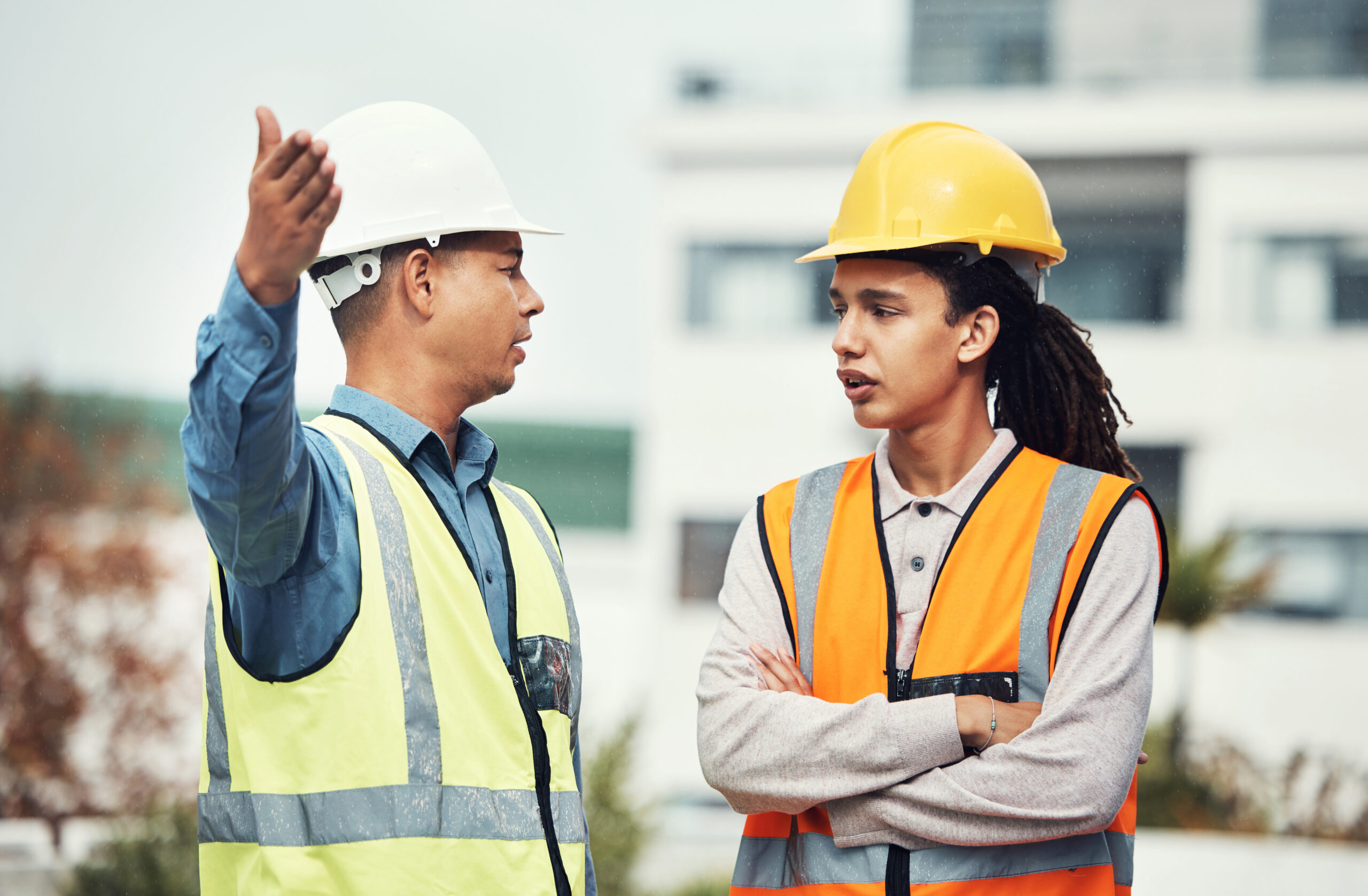 Collaboration, engineering and review with people on construction site for project management, buil.